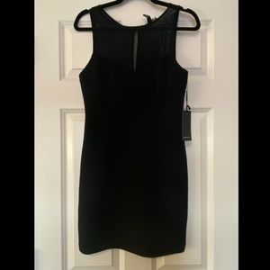 Forever 21 black bodycon dress with mesh straps; NWT. Size M.